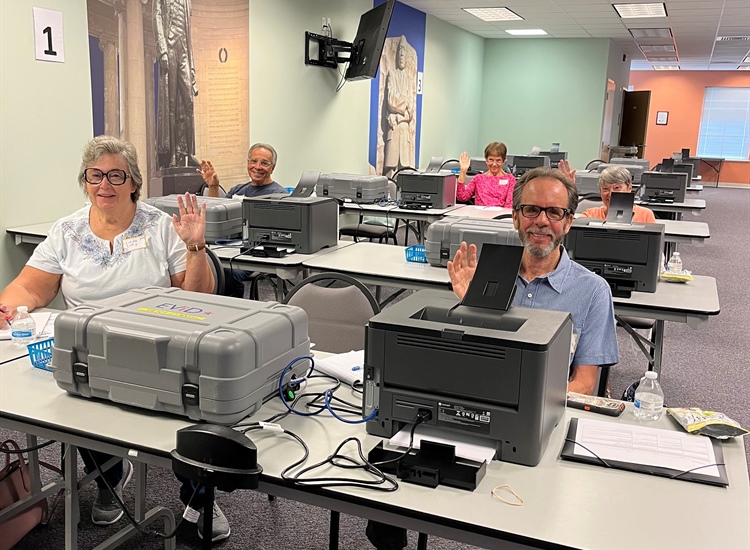 An Image of Poll workers in training